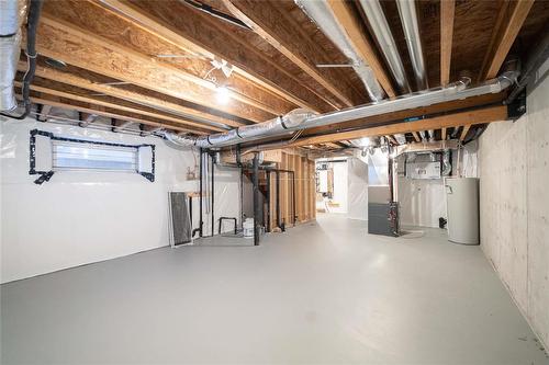 182 Moonlight Bay, Winnipeg, MB - Indoor Photo Showing Basement