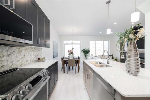 182 Moonlight Bay, Winnipeg, MB - Indoor Photo Showing Kitchen With Double Sink With Upgraded Kitchen