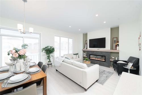 182 Moonlight Bay, Winnipeg, MB - Indoor Photo Showing Living Room With Fireplace