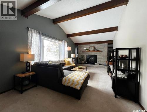 119 Macdonald Place, Swift Current, SK - Indoor Photo Showing Living Room With Fireplace