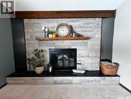 119 Macdonald Place, Swift Current, SK - Indoor Photo Showing Other Room With Fireplace