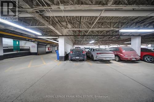 1 Indoor Parking Spot - Close to Door - 306 - 44 Bond Street W, Oshawa (O'Neill), ON - Indoor Photo Showing Garage