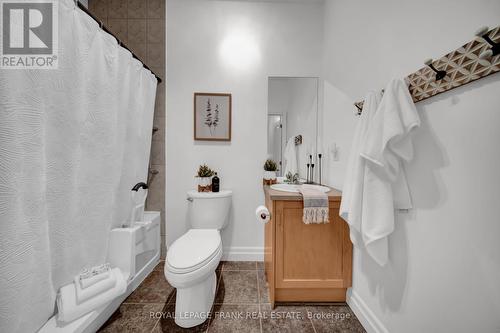 Ensuite with Walk-in Tub Conversion and Grab Bars. - 306 - 44 Bond Street W, Oshawa (O'Neill), ON - Indoor Photo Showing Bathroom