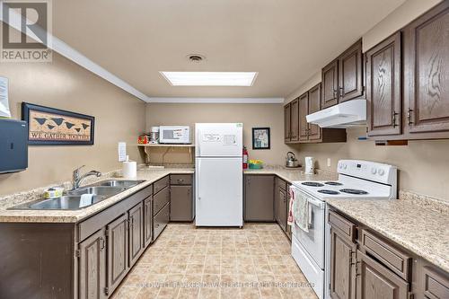 18 Devon Drive, South Huron (Exeter), ON - Indoor Photo Showing Kitchen With Double Sink