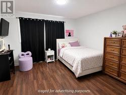 Bedroom #3, staged for advertising purposes - 
