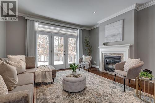 101 - 5 Woodhaven Drive, Tillsonburg, ON - Indoor Photo Showing Living Room With Fireplace