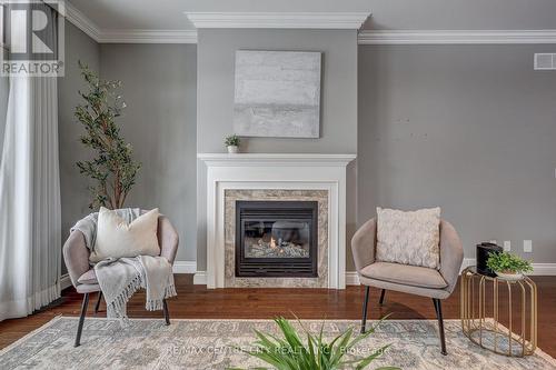 101 - 5 Woodhaven Drive, Tillsonburg, ON - Indoor Photo Showing Living Room With Fireplace
