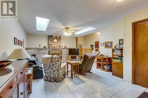 Main floor family room with gas fireplace - 234 Manitoulin Drive, London East (East O), ON - Indoor Photo Showing Dining Room