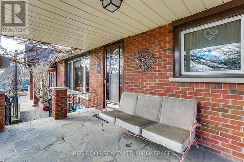 Covered Veranda with Flagstone floor - 234 Manitoulin Drive, London East (East O), ON - Outdoor With Deck Patio Veranda With Exterior