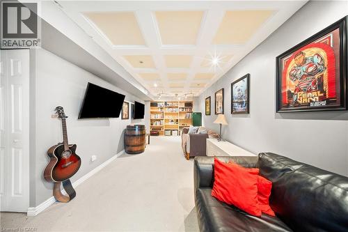Carpeted living room featuring coffered ceiling and beamed ceiling - 132 Blackburn Drive, Brantford, ON - Indoor Photo Showing Other Room
