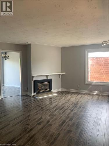 66 Kennedy Avenue, Hamilton, ON - Indoor Photo Showing Living Room With Fireplace