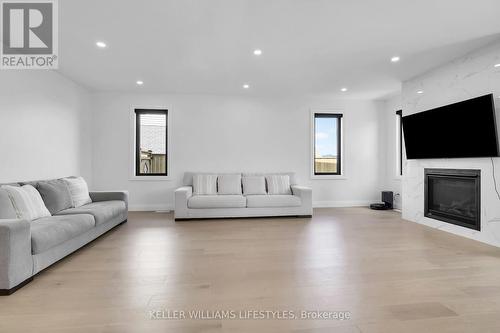 104 Crestview Drive, Middlesex Centre, ON - Indoor Photo Showing Living Room With Fireplace