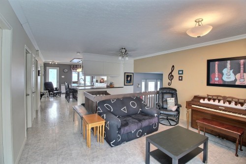 Salon - 38 Av. Renaud, Rouyn-Noranda, QC - Indoor Photo Showing Other Room