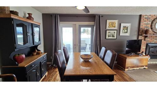 606 302Nd Street, Kimberley, BC - Indoor Photo Showing Dining Room With Fireplace