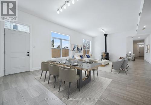 This photo has been virtually staged. - 149 Woolwich Street, Waterloo, ON - Indoor Photo Showing Dining Room