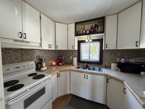 Cuisine - 26 Rue Gaspésienne E., Pointe-À-La-Croix, QC - Indoor Photo Showing Kitchen With Double Sink