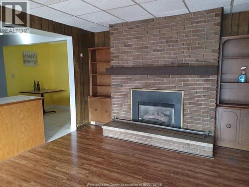 3277 Dominion, Windsor, ON - Indoor Photo Showing Living Room With Fireplace