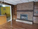 3277 Dominion, Windsor, ON  - Indoor Photo Showing Living Room With Fireplace 