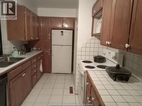 3277 Dominion, Windsor, ON - Indoor Photo Showing Kitchen With Double Sink