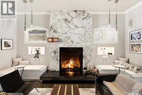 3606 Selinger Crescent, Regina, SK - Indoor Photo Showing Living Room With Fireplace