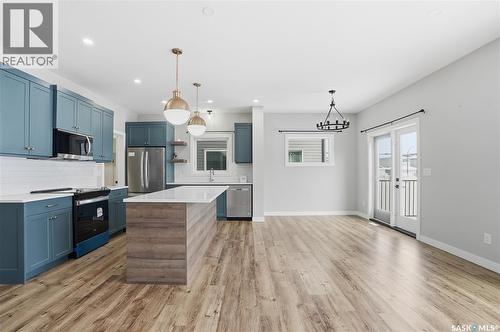 330 Aniskotaw Bend, Saskatoon, SK - Indoor Photo Showing Kitchen With Stainless Steel Kitchen With Upgraded Kitchen
