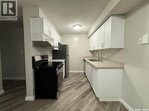 101 1822 Eaglesham Avenue, Weyburn, SK - Indoor Photo Showing Kitchen