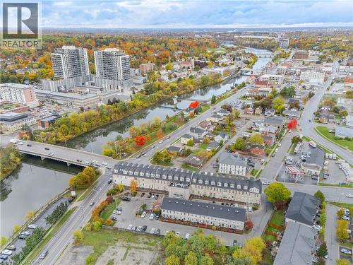 View of urban area featuring a large body of water and a notable bridge - 25 Concession Street Unit# 201, Cambridge, ON - Outdoor With View