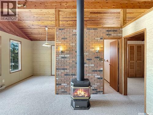 102 Lakeshore Drive, Echo Bay, SK - Indoor Photo Showing Other Room With Fireplace