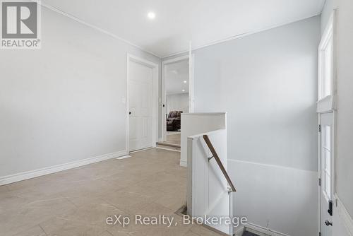 Mudroom/ laundry and basement access - 60 Main Street E, Mapleton, ON - Indoor Photo Showing Other Room