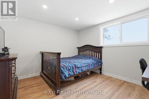 Basement bedroom backyard view - 60 Main Street E, Mapleton, ON - Indoor Photo Showing Bedroom