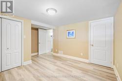 Basement bedroom with closet and storage - 