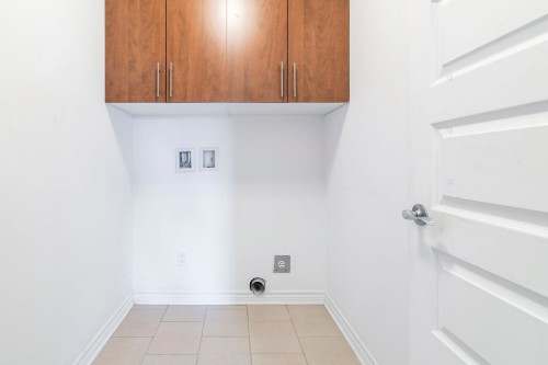 Laundry - 302-5565 Av. Albanie, Brossard, QC - Indoor Photo Showing Other Room