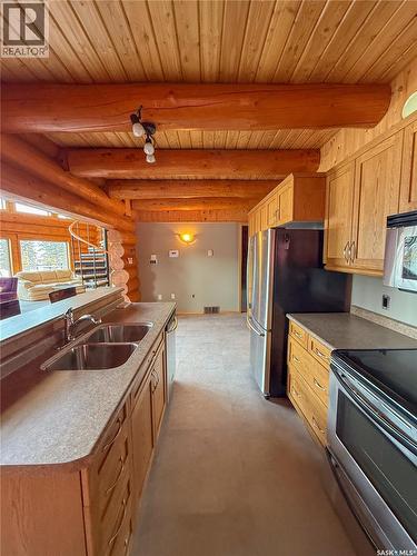 1512 Birch Drive, Turtle Lake, SK - Indoor Photo Showing Kitchen With Double Sink
