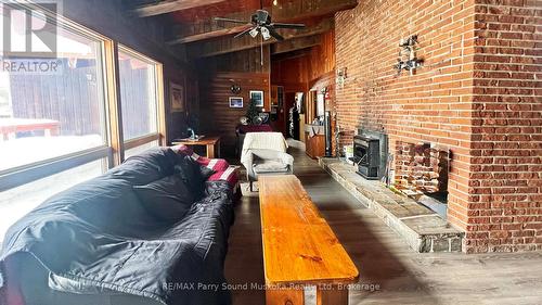 45 Ridgeway Drive, Carling, ON - Indoor With Fireplace