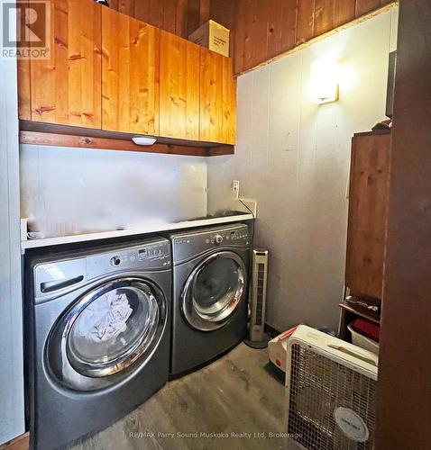 Main floor laundry - 45 Ridgeway Drive, Carling, ON - Indoor Photo Showing Laundry Room