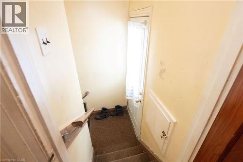Side door and stairs to lower level - 90 Osler Drive, Dundas, ON - Indoor Photo Showing Other Room