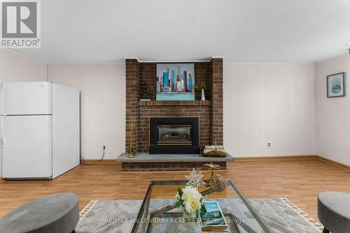 2437 Chilsworthy Avenue, Mississauga, ON - Indoor Photo Showing Living Room With Fireplace