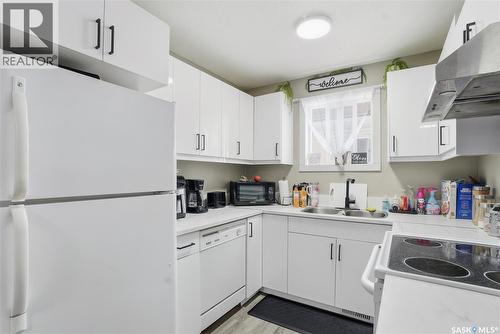 119 - 121 Olmstead Road, Saskatoon, SK - Indoor Photo Showing Kitchen With Double Sink