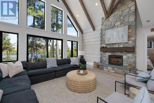 44 - 1211 Foreman Road, Muskoka Lakes (Medora), ON - Indoor Photo Showing Living Room With Fireplace