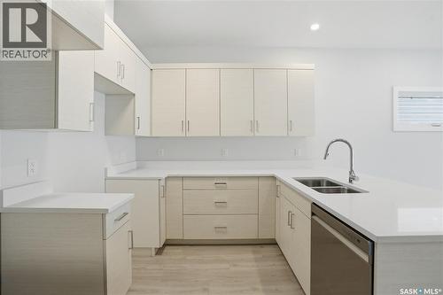 527 Sharma Crescent, Saskatoon, SK - Indoor Photo Showing Kitchen With Double Sink