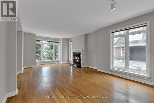 145 Manorhill Private, Ottawa, ON - Indoor Photo Showing Living Room With Fireplace