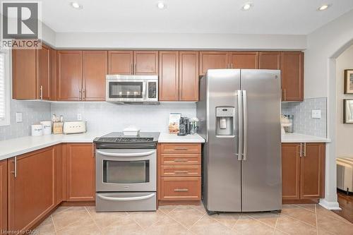 S/S Appliances w/newer French Door Fridge - 3140 Edgar Avenue, Burlington, ON - Indoor Photo Showing Kitchen