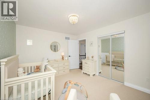 Bright 2nd Bedroom with oversized Closet - 3140 Edgar Avenue, Burlington, ON - Indoor Photo Showing Laundry Room