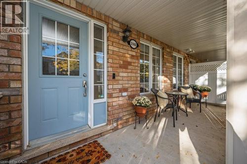 Welcoming covered front porch, perfect for relaxing out doors. - 3140 Edgar Avenue, Burlington, ON - Outdoor With Deck Patio Veranda With Exterior