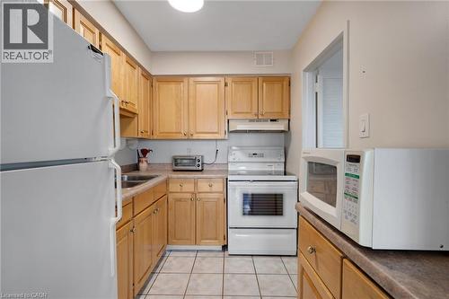 24 Midland Drive Unit# 708, Kitchener, ON - Indoor Photo Showing Kitchen With Double Sink