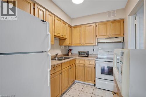 24 Midland Drive Unit# 708, Kitchener, ON - Indoor Photo Showing Kitchen With Double Sink