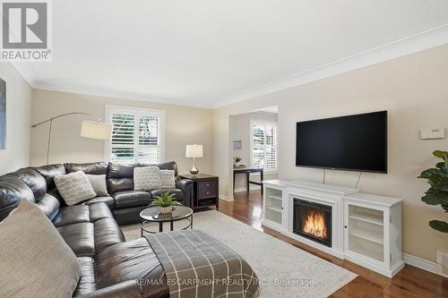 1995 Kerns Road, Burlington, ON - Indoor Photo Showing Living Room With Fireplace