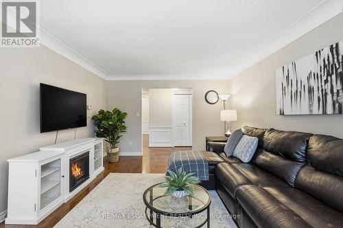 1995 Kerns Road, Burlington, ON - Indoor Photo Showing Living Room With Fireplace