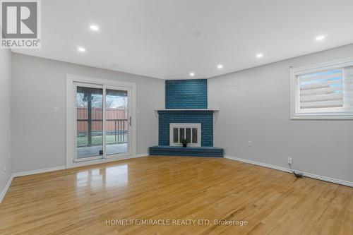 2 Envoy Boulevard, Hamilton, ON - Indoor Photo Showing Other Room With Fireplace
