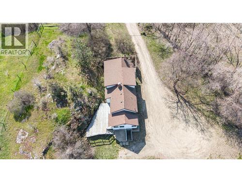 Aerial of 1942 farmhouse - 10091 6 Highway, Coldstream, BC 